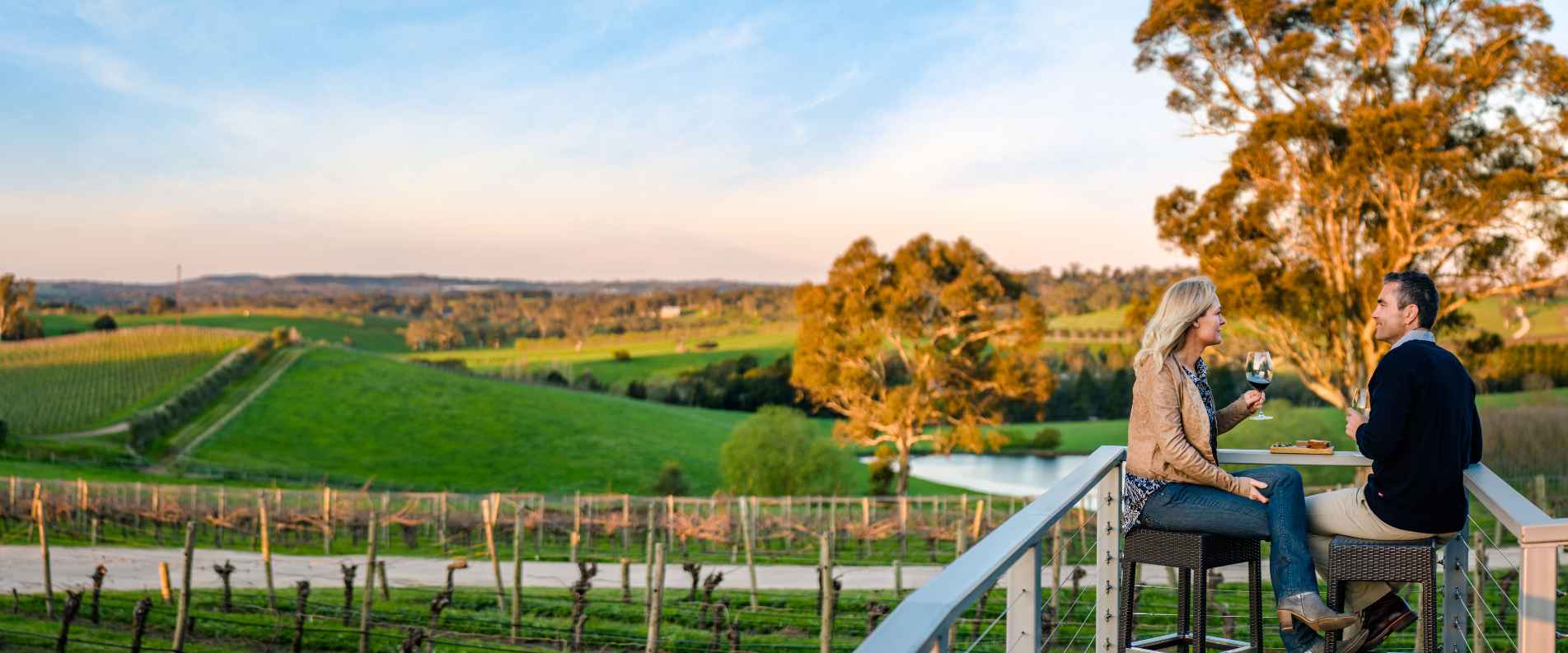 Couple drinking wine at winery in the Barossa Valley