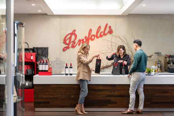 People enjoying a wine tasting at Penfolds
